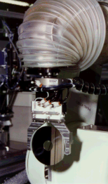 Magnum PET Gripper on a Kawasaki clean room robot.
