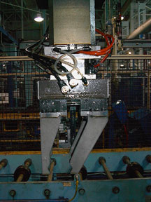 Magnum grippers on a cam shaft line